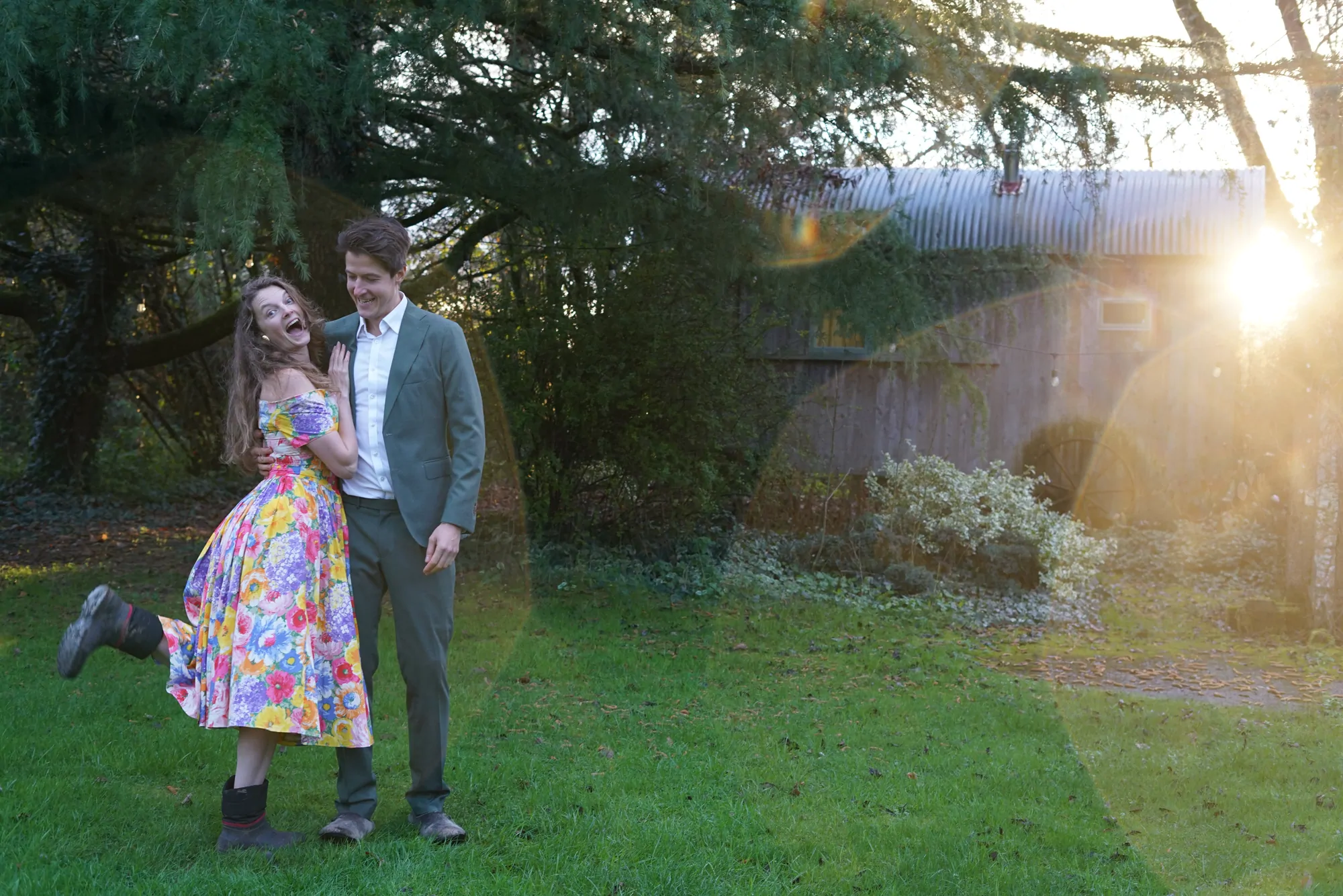 Anton and Morgane dancing on the lawn in the low evening sun